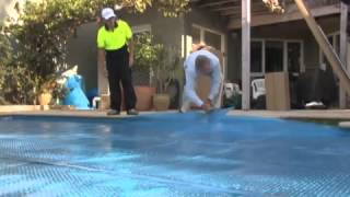 Pool Cover and Roller Installation Guide How to Install a Daisy Solar Blanket and Roller [upl. by Adirem]