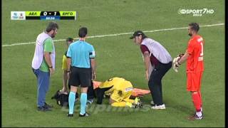 Greek stretcher bearers drop injured player while taking him off pitch [upl. by Rettig393]