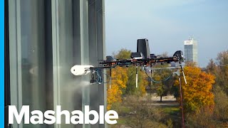 This Drone Is Cleaning Windows 1100 Feet Above the Ground [upl. by Yenterb672]